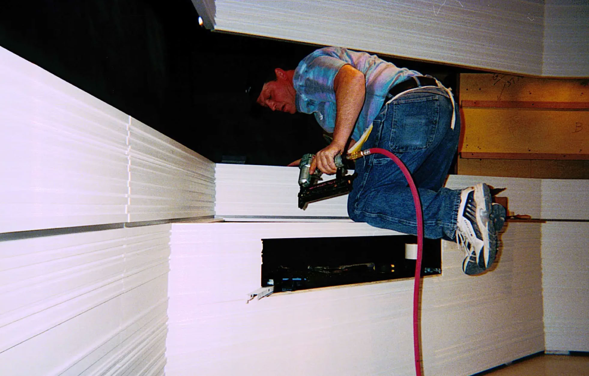 Swiss Packaging museum installation team preparing the retail environment, coordinating display systems, lighting, and presentation as part of flagship execution.
