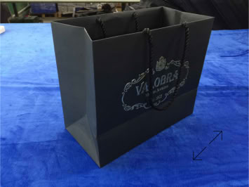 Valobra shopping bag in dyed paper by Swiss Packaging.