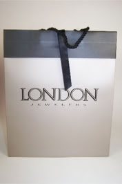 London Jewelers tuxedo Luxury shopping bag with inverted foldover and ribbon security tab with black cord twisted handles designed and manufactured by Swiss Packaging