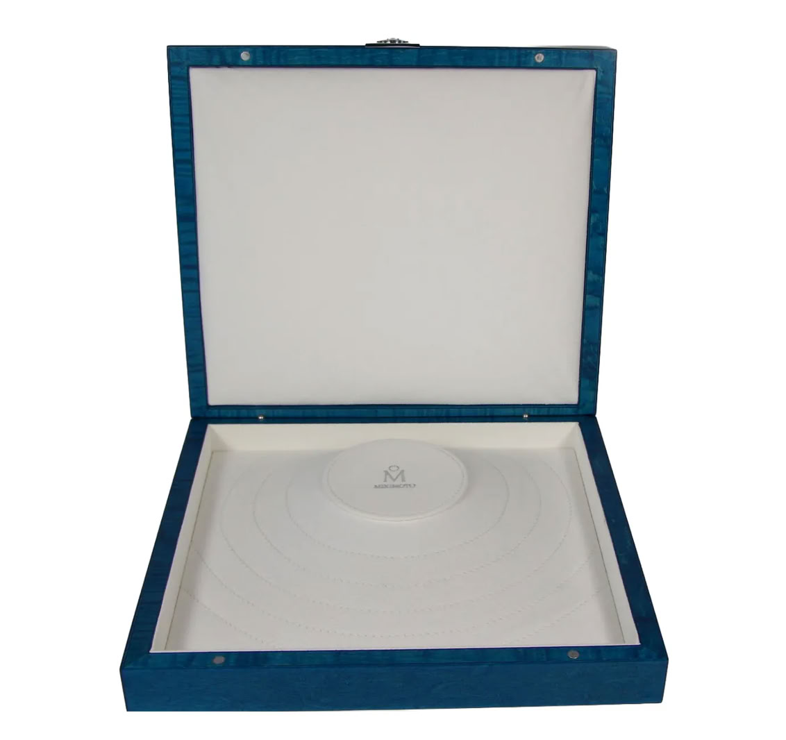 Interior layout of luxury jewelry packaging box designed for high-value client presentation by Mikimoto