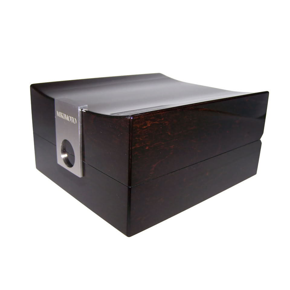 Luxury jewelry box in birdseye maple finish developed as a final material variation for Mikimoto VIP packaging