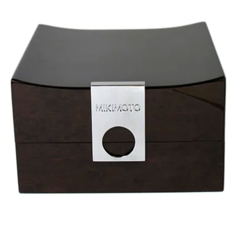Front view of luxury jewelry packaging box with precision stainless steel tab lock for Mikimoto VIP presentation