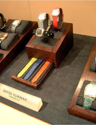 David Yurman Display of various watches on stands with interchangeable colored straps in a drawer below design and design and manufacturing by Swiss Packaging of New York and Switzerland