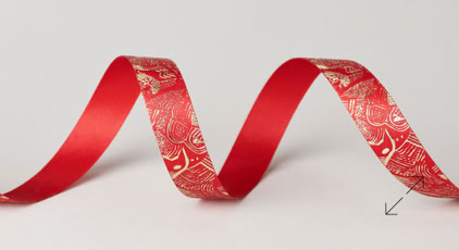 Exclusive Red Engraved Luxury Ribbon by Swiss Packaging